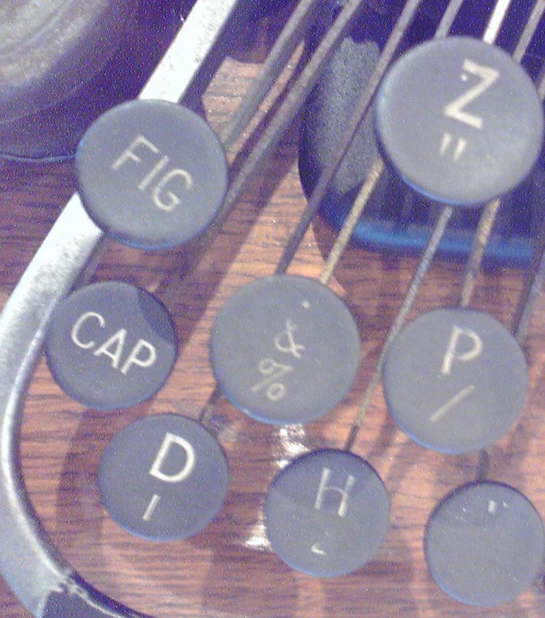 キーボード左端の「CAP」と「FIG」キー
